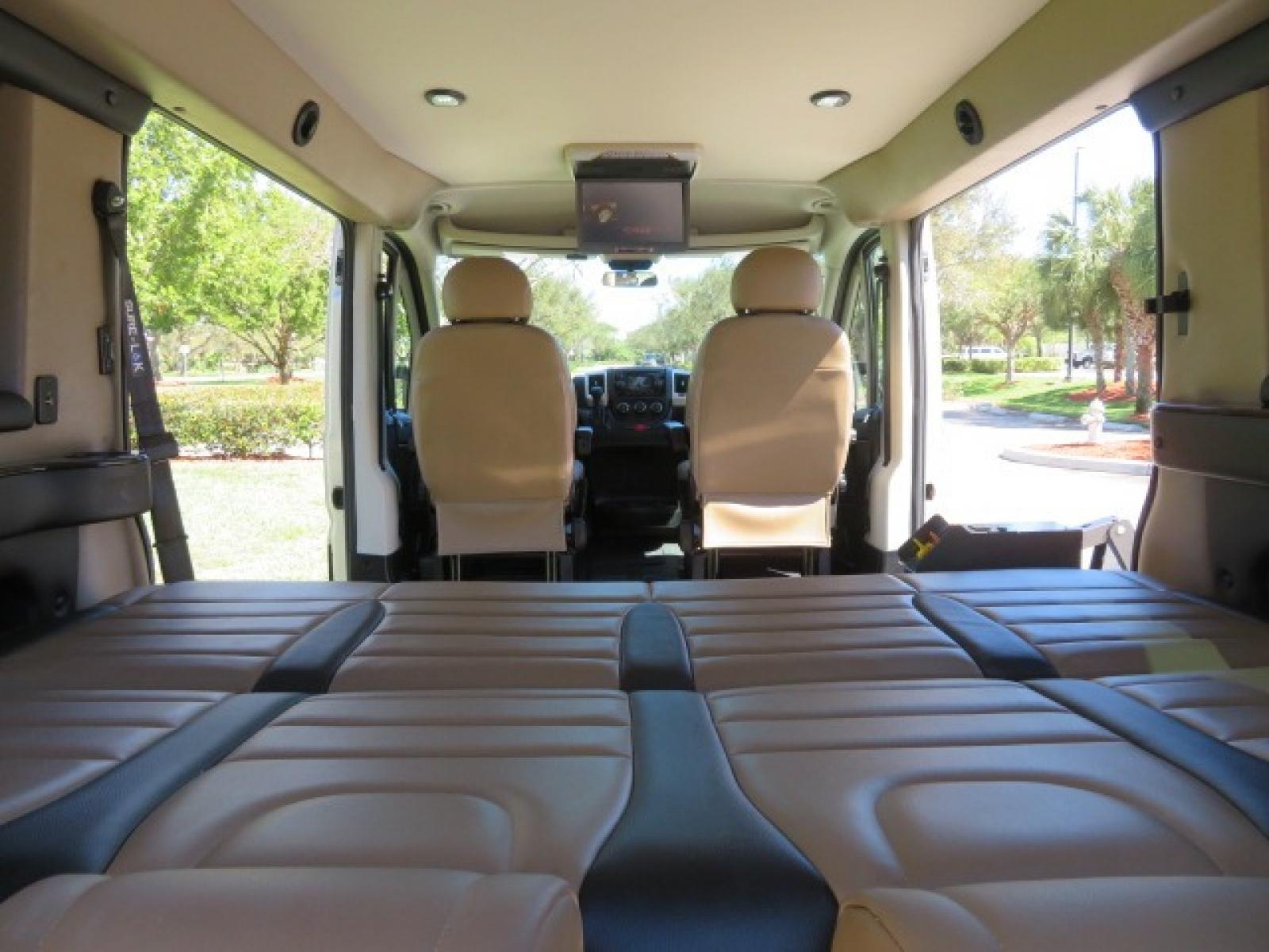 2016 Gold /Tan and Black Leather RAM Promaster (3C6TRVAG5GE) , located at 4301 Oak Circle #19, Boca Raton, FL, 33431, (954) 561-2499, 26.388861, -80.084038 - You are looking at a Gorgeous 2016 Ram Promaster Tempest X Handicap Wheelchair Conversion Van with 30K Original Miles, Lowered Floor, Dual Side Entry Doors, Power Passenger Side Entry Door, 750lb Braunability Wheelchair Lift, 4 Passenger Rear Power Bench Seat/Bed, Navigation, Rear Entertainment, Sur - Photo #73